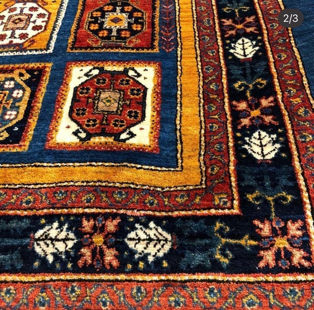 Authentic Qashqai Rug Handwoven with Handspun Wool 

This authentic Qashqai Gabbeh rug is handcrafted using traditional techniques passed down through generations. The wool used in this rug is entirely handspun, meaning it is not processed by industri